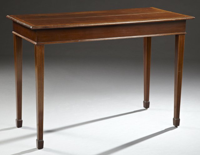 Edwardian Mahogany Side Table, early 20th century, in: Edwardian Mahogany Side Table, early 20th century, in the Georgian taste, raised on tapering square legs ending in spade feet, h. 40-1/2", w. 50-1/2", d. 24".