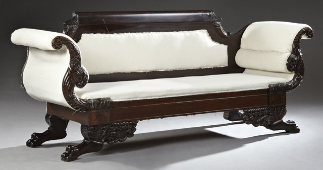 American Classical Carved Mahogany Sofa, 19th c., New: American Classical Carved Mahogany Sofa, 19th c., New York, the curved crest rail flanked by carved cornucopias, to double rolled arms with carved cornucopias, over a table skirt, to acanthus and frui