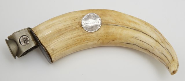 Boar Tusk Cigar Nipper, c. 1910, the side with a silver: Boar Tusk Cigar Nipper, c. 1910, the side with a silver button engraved "Charles," H.- 6 3/8 in., W.- 3 3/8 in., D.- 1 5/8 in.