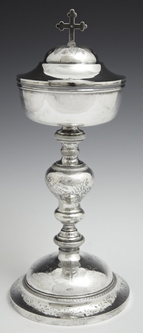 French First Standard Silver and Silverplate Ciborium,: French First Standard Silver and Silverplate Ciborium, 19th c., with a gilt washed interior, on a knopped support to a sloping stepped base with floral incised decoration, H.- 11 1/4 in., W.- 4 5/8 in
