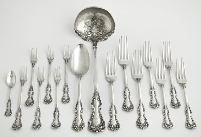 Sixteen Pieces of Sterling Flatware, 1898, in the: Sixteen Pieces of Sterling Flatware, 1898, in the "Revere" pattern, by International, consisting of a soup spoon, a large ladle, 6 seafood cocktail forks, 4 luncheon forks, 3 dinner forks, and a demit
