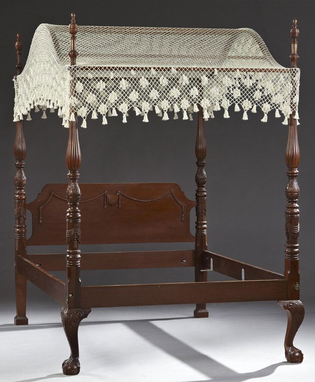 Contemporary Carved Mahogany Chippendale Style Canopy: Contemporary Carved Mahogany Chippendale Style Canopy Bed, 20th c., queen size, with an arched canopy on carved turned and reeded posts, to a footboard on ball and claw feet, the shaped headboard with