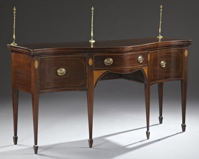 English Georgian Style Inlaid Mahogany Bow Front: English Georgian Style Inlaid Mahogany Bow Front Sideboard, 19th c., the back with three brass posts, with a central frieze drawer, flanked by a concave cupboard and a concave cellarette drawer, on ta
