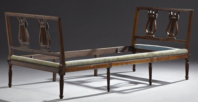 French Louis XVI Style Carved Mahogany Day Bed, 19th: French Louis XVI Style Carved Mahogany Day Bed, 19th c., the head and foot boards with reeded edge and central double pierced lyre splats, to tapered reeded legs on French toes, H.- 33 in., Int. W.- 3