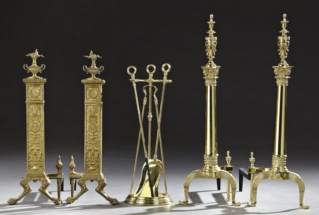 Two Pairs of Louis XVI Style Andirons and Fireplace: Two Pairs of Louis XVI Style Andirons and Fireplace Tools, early 20th c., one example of gilt brass with flaming urn finials over a foliate relief support, the second of polished brass with beribboned