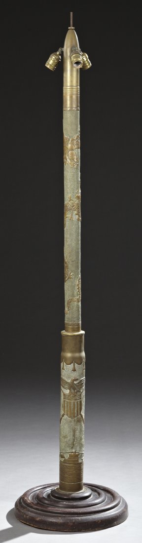 U.S. Navy WWII Trench Art Three Light Floor Lamp, mid: U.S. Navy WWII Trench Art Three Light Floor Lamp, mid 20th c., commemorating the USS Vestal (1909-1946) composed of artillery shells, with a relief eagle over an oriental dragon, on a base with a USN 