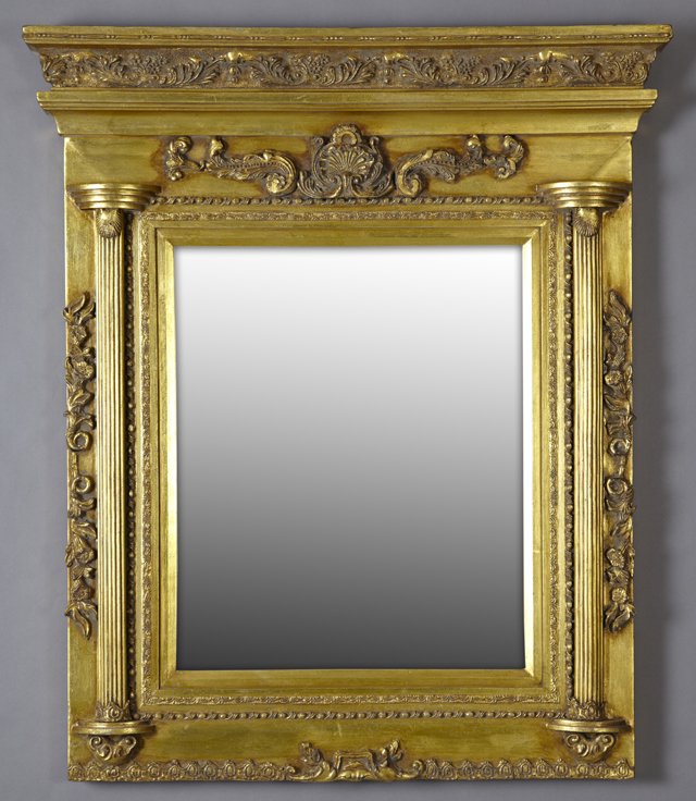 French Overmantel Gilt and Gesso Mirror, 20th c., with: French Overmantel Gilt and Gesso Mirror, 20th c., with a stepped foliate crown over a central relief shell above a wide beveled plate flanked by applied reeded half columns, and relief floral edges, o