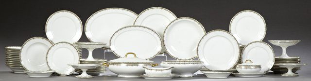 Seventy-Nine Piece Set of Limoges Porcelain Dinnerware,: Seventy-Nine Piece Set of Limoges Porcelain Dinnerware, early 20th c., by Bernardaud & Co., with gilt rims and floral transfer banded borders, consisting of 32 dinner plates, 12 soup bowls, 19 salad p
