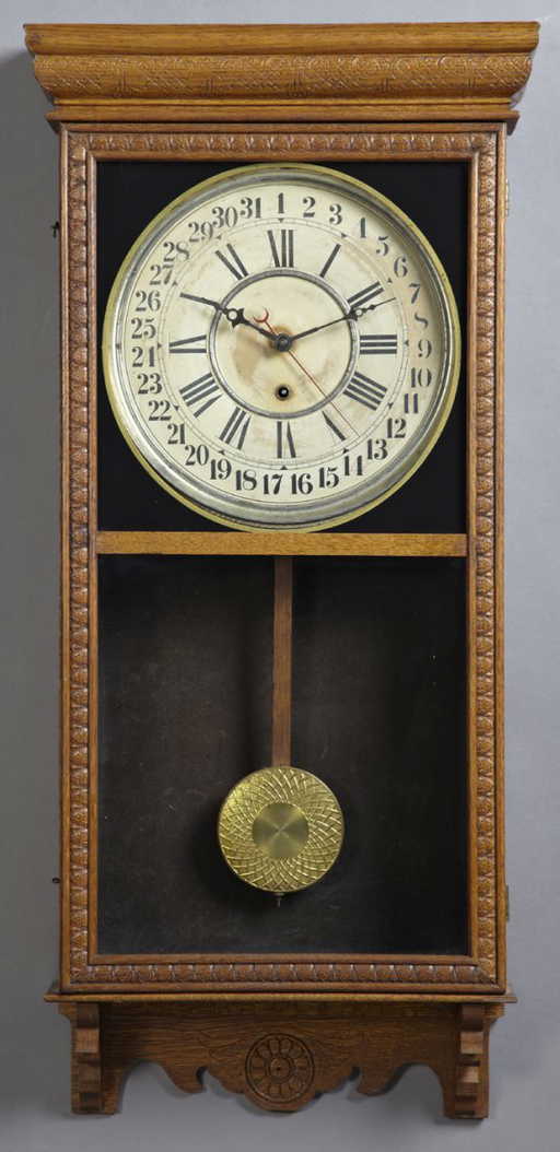 Sessions Carved Oak Calendar Wall Clock, c. 1900, the