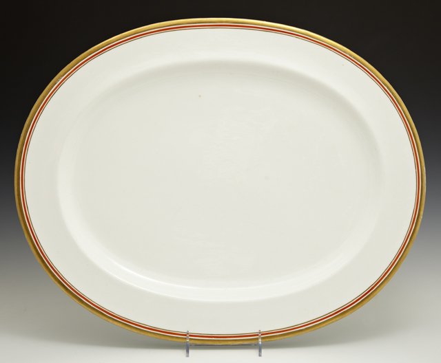Large Old Paris Porcelain Platter, 19th c.: Large Old Paris Porcelain Platter, 19th c., with a gilt rim around orange and brown line banding, H.- 1 1/2 in., W.- 21 1/2 in., D.- 16 3/4 in.