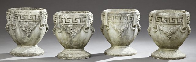 Set of Four Cast Stone Garden Planters, 20th c.: Set of Four Cast Stone Garden Planters, 20th c., in the Neo-Grec taste, having a Greek key band over relief garland and berry base, H.- 16 1/2 in., Dia.- 14 in.