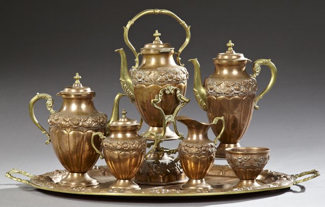 Mexican Seven Piece Copper and Brass Tea and Coffee: Mexican Seven Piece Copper and Brass Tea and Coffee Set, mid 20th c., consisting of a coffee pot, a teapot, a creamer, a waste bowl, a covered sugar, a hot water kettle on stand with burner, and handl