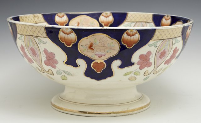 English Ironstone Footed Punch Bowl, 19th c., in the: English Ironstone Footed Punch Bowl, 19th c., in the "Imari" pattern, with gilt, cobalt, and orange floral decoration, H.- 6 in., Dia.- 12 3/4 in.