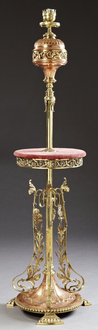 Rare American Late Victorian Brass and Copper Organ: Rare American Late Victorian Brass and Copper Organ Lamp, 19th c., the reticulated font holder mounted to a circular padded table, on a columnar support, centering three foliate cast legs, on a copper