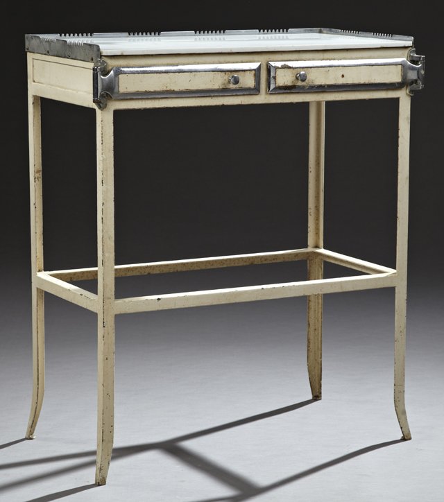 French Industrial Tole Chrome and Glass Dentist's: French Industrial Tole Chrome and Glass Dentist's Table, c. 1910, the milk glass top within a three quarter galleried grooved edge, over two hinged embossed glass lined drawers, above an open shelf, o