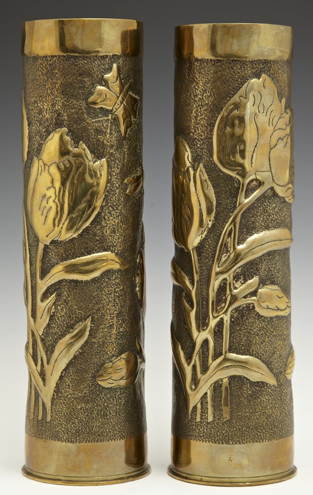 Pair of Brass Trench Art Vases, c. 1918, with repousse: Pair of Brass Trench Art Vases, c. 1918, with repousse floral, butterfly and dragonfly decoration on a pokerwork ground, H.- 11 3/8 in, W.- 3 3/8 in.