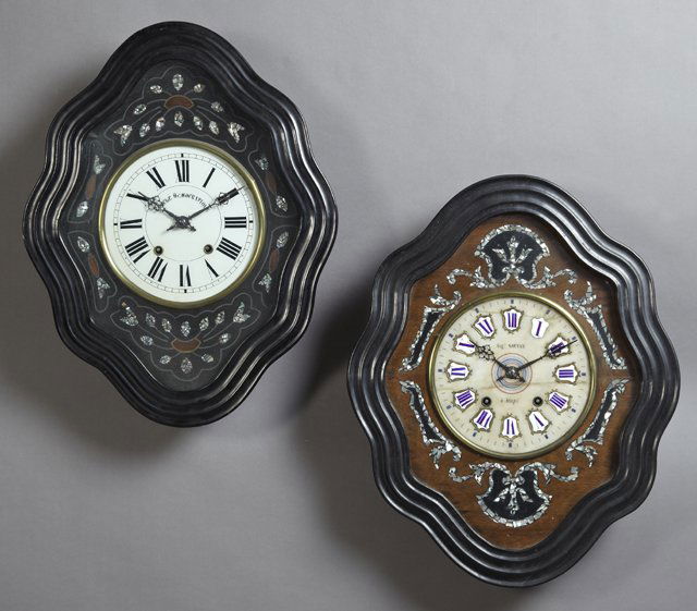 Pair of French Ebonized Wall Clocks, c. 1870, time and: Pair of French Ebonized Wall Clocks, c. 1870, time and strike, one with an enamel dial within a border inlaid with mother-of-pearl; the second with a white marble dial with porcelain chapter marks, wi