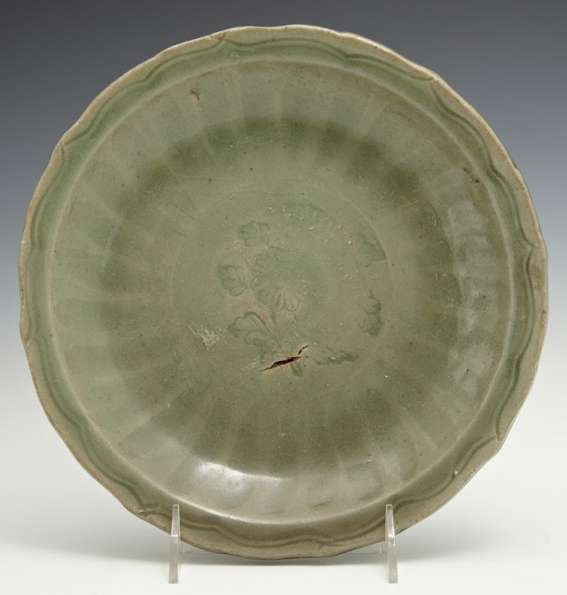 Southern Chinese or Vietnamese Celadon Barbed Rim Dish: Southern Chinese or Vietnamese Celadon Barbed Rim Dish , late 18th/early 19th c., the interior with gently fluted sides rising to an everted barbed rim with incised line decoration, the center with in