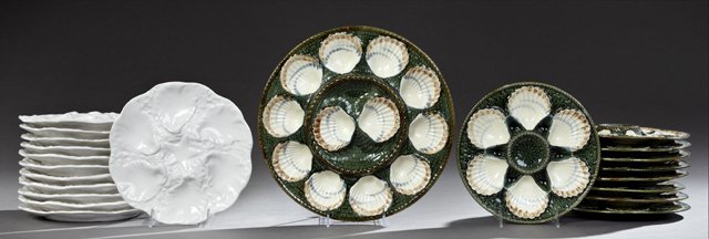 Ten Piece Ironstone Oyster Set, 19th c., by Longchamps,: Ten Piece Ironstone Oyster Set, 19th c., by Longchamps, consisting of 9 plates and a platter, together with 12 white oyster plates, Longchamps Platter- H.- 1 1/8 in., Dia.- 13 1/4 in.
