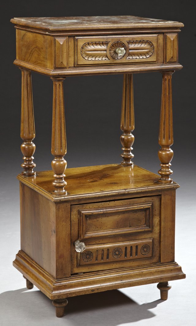 French Henri II Style Carved Walnut Marble Top: French Henri II Style Carved Walnut Marble Top Nightstand, early 20th c., the inset highly figured rouge marble over a carved frieze, on tapered turned reeded supports above an open shelf, over a cupb
