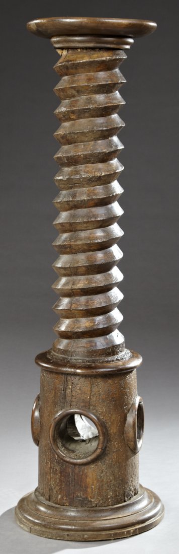 French Provincial Carved Birch Pedestal, 19th c.,: French Provincial Carved Birch Pedestal, 19th c., constructed from a wine press screw with a circular dished top, on a pierced socle to a stepped circular base, H.- 51 1/2 in., Dia.- 15 in.