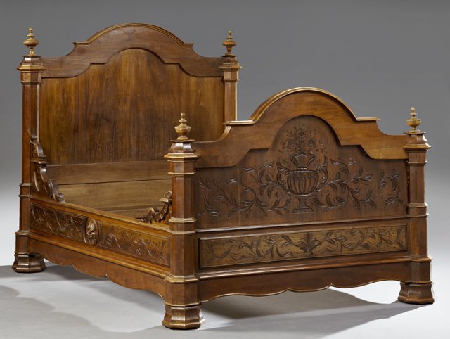French Henri II Style Carved Walnut Lit du Coin, early: French Henri II Style Carved Walnut Lit du Coin, early 20th c., the arched head and footboard with octagonal supports, the footboard with incised flowering urn decoration, with scalloped incised flora