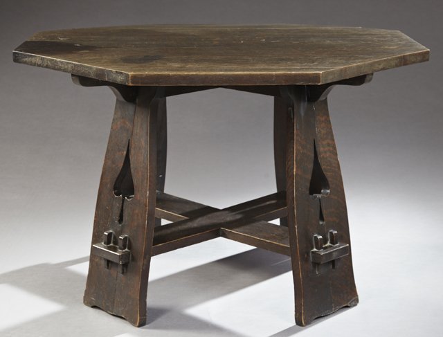 American Arts and Crafts Carved Quarter Sawn Oak Games: American Arts and Crafts Carved Quarter Sawn Oak Games Table, early 20th c., possibly Charles Limbert (1854-1923), Model #120, the octagonal top on pierced spade legs joined by through tenon x-form st