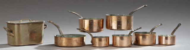 Eight Pieces of French Copper Cookware, early 20th c.,: Eight Pieces of French Copper Cookware, early 20th c., consisting of 7 graduated saucepans with iron handles, and a curved daubiere with copper handles, Daubiere- H.- 7 in., W.- 12 3/4 in., D.- 7 in.