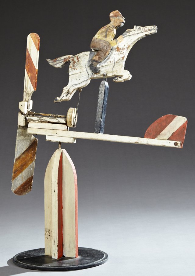 Polychromed Carved Wooden Whirligig of a Horse and: Polychromed Carved Wooden Whirligig of a Horse and Jockey, New Hampshire, c. 1930, on an integral wooden base, H.- 32 in., W.- 22 1/2 in., D.- 12 1/2 in.