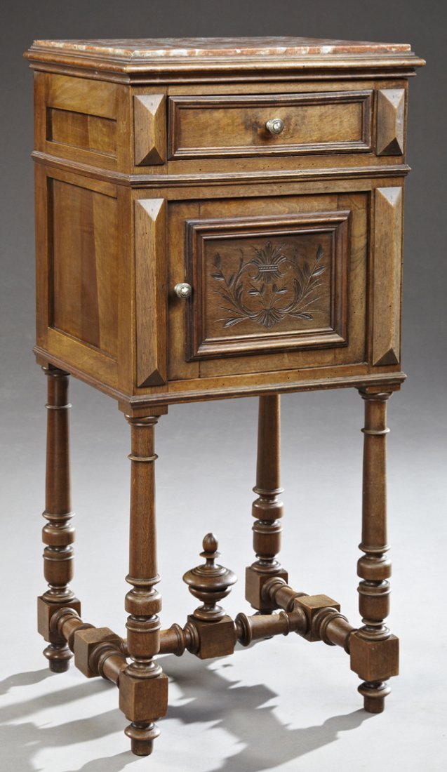 French Henri II Style Carved Walnut Marble Top: French Henri II Style Carved Walnut Marble Top Nightstand, c. 1890, the inset highly figured rouge marble over a frieze drawer above an incised cupboard door flanked by applied stiles, on ring turned 