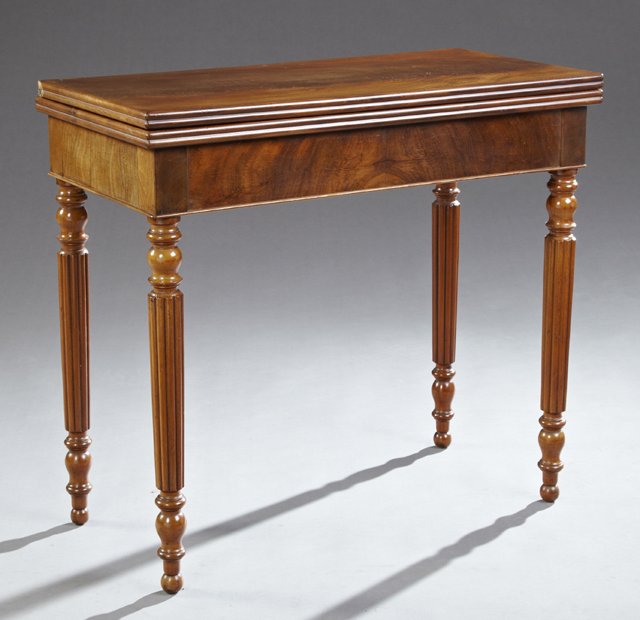 French Louis Philippe Carved Mahogany Games Table, 19th: French Louis Philippe Carved Mahogany Games Table, 19th c., the rectangular top lifting to a green baize playing surface with gilt tooled edges, over a wide skirt, on ring turned tapered fluted legs o