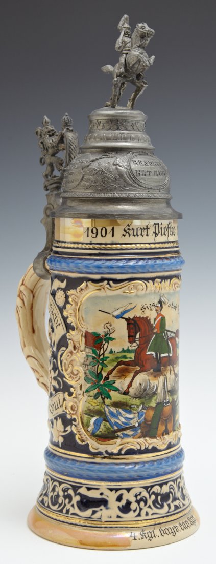 Mettlach Pewter Top Regimental Stein, c. 1903, by: Mettlach Pewter Top Regimental Stein, c. 1903, by Villeroy and Boch, from the 4th Bavarian Regiment, with a painted soldier on horseback, H.- 12 3/8 in., W.- 5 1/4 in., D.- 4 3/16 in.