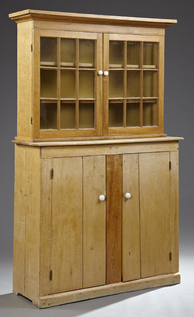 Southern Carved Pine and Cypress Kitchen Cupboard, 19th: Southern Carved Pine and Cypress Kitchen Cupboard, 19th c., the stepped ogee crown over double mullioned glazed cupboard doors, on a base with double cupboard doors, H.- 81 3/4 in., W.- 51 1/2in., D.-