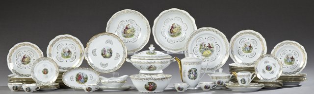 Sixty-Four Piece Set of French Porcelain Dinnerware,: Sixty-Four Piece Set of French Porcelain Dinnerware, mid 20th c., with gilt rims and tracery borders around transfer reserves of lovers in gardens, consisting of 24 dinner plates, 12 soup bowls, 11 sa