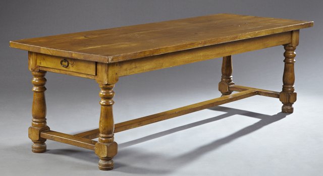 French Provincial Carved Elm Farmhouse Table, 19th c.,: French Provincial Carved Elm Farmhouse Table, 19th c., the rectangular top over a wide skirt with flanking end drawers, on ring turned tapered legs to bun feet, joined by an H-form stretcher, H.- 30 i