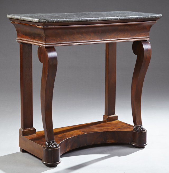 French Empire Carved Mahogany Marble Top Pier Table,: French Empire Carved Mahogany Marble Top Pier Table, 19th c., the rectangular curved corner highly figured grey marble over a frieze drawer, on S-scroll supports to carved paw feet joined by a concave