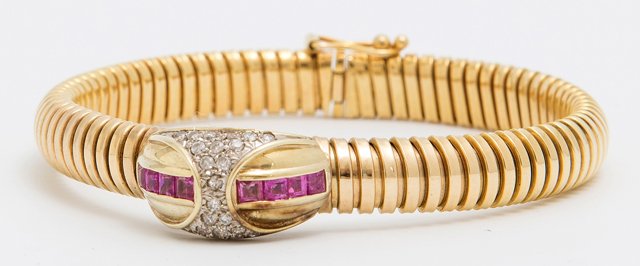 Italian 14K Yellow Gold Snake Bracelet, mid 20th c.,: Italian 14K Yellow Gold Snake Bracelet, mid 20th c., the center with a domed enhancer with a central band of princess cut rubies, divided by a shaped band of pave diamonds, L..- 7 1/8 in., Wt.- .6 tro