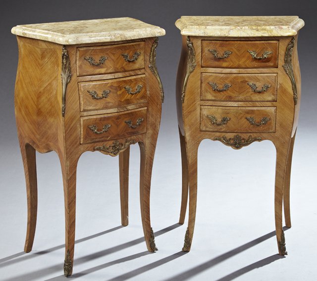 Pair of French Louis XV Style Ormolu Mounted Rosewood: Pair of French Louis XV Style Ormolu Mounted Rosewood Marble Top Nightstands, 20th c., the serpentine highly figured ochre marbles over three bombe drawers flanked by ormolu mounted stiles and crotche