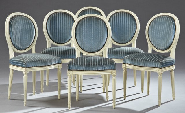 Set of Six French Louis XVI Style Polychromed Beech: Set of Six French Louis XVI Style Polychromed Beech Upholstered Dining Chairs, late 19th c., the medallion backs over bowed seats on ring turned tapered fluted legs to toupie feet, now in creme paint 