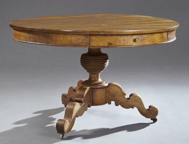 French Provincial Louis XV Style Carved Walnut Dining: French Provincial Louis XV Style Carved Walnut Dining Table, 19th c., the circular top over a wide skirt with two frieze drawers, on a ring turned baluster support on tripodal serpentine scrolled legs