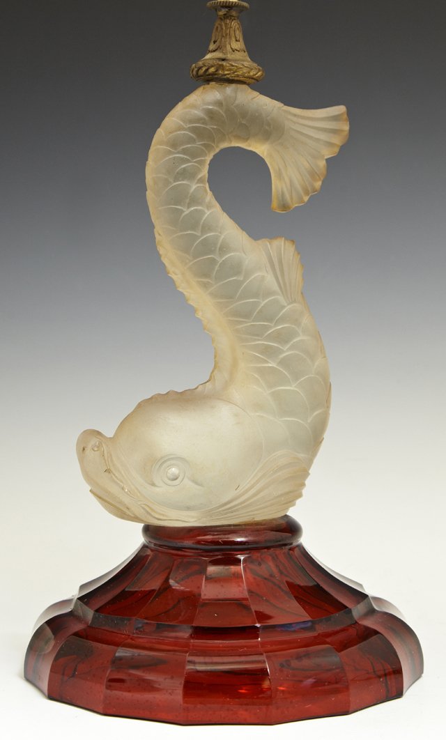 Unusual Frosted Glass Dolphin Form Candlestick, early: Unusual Frosted Glass Dolphin Form Candlestick, early 20th c., on a stepped lobed red glass base, now wired as a lamp, H.- 11 1/4 in., Dia.- 6 1/4 in.