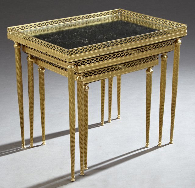Nest of Three French Mirrored Gilt Brass Side Tables,: Nest of Three French Mirrored Gilt Brass Side Tables, 20th c., the inset mirrored tops surround by a pierced gallery, on twisted tapered legs with toupie feet, Largest- H.- 18 in., W.- 20 1/4 in., D.-