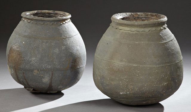 Pair of Large French Provincial Earthenware Baluster: Pair of Large French Provincial Earthenware Baluster Jars, 19th c., the everted rims over scalloped decoration, the sides with relief line decoration, one impressed "AE," H.- 20 in., Dia.- 20 in.