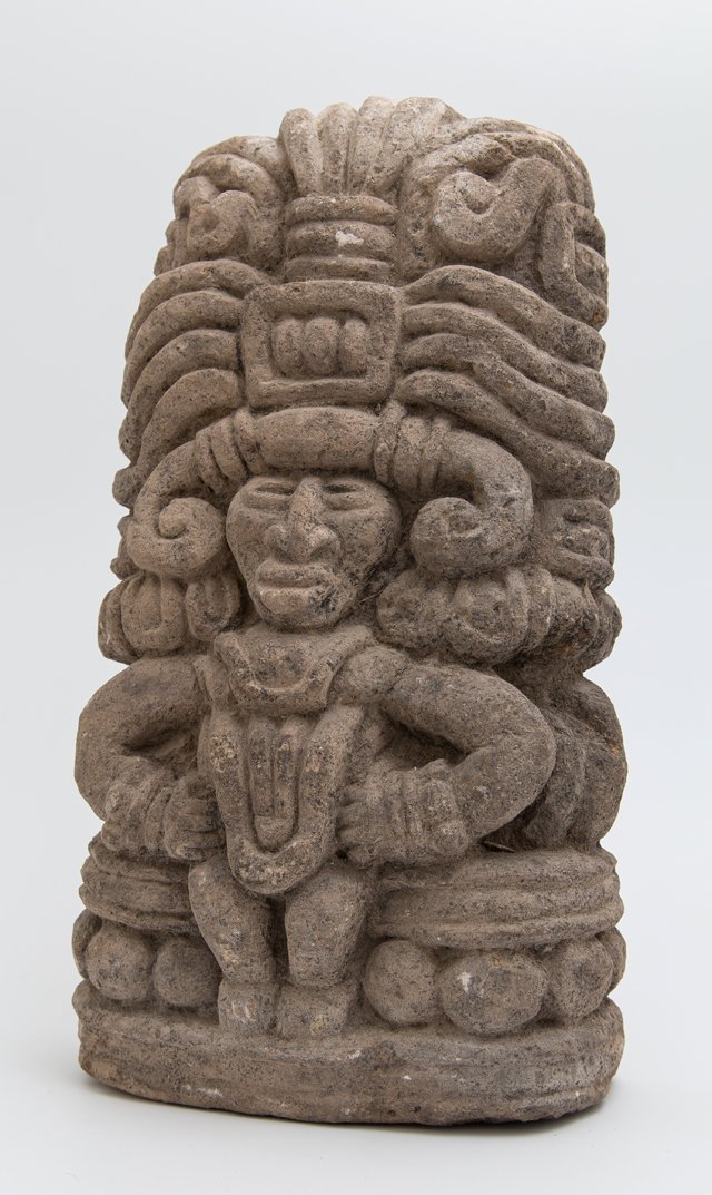 Pre-Columbian Carved Stone Figure, of a man in an: Pre-Columbian Carved Stone Figure, of a man in an elaborate headdress and a breastplate, H.- 13 1/4 in., W.- 7 1/2 in., D.- 3 1/2 in.
