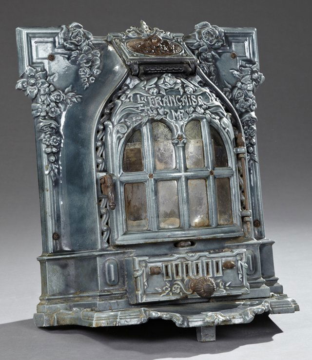 French Louis XIV Style Blue Porcelain Enameled Cast: French Louis XIV Style Blue Porcelain Enameled Cast Iron Heater, 19th c., a beribboned fall front fuel door over a bowed mullioned glazed door above a lower drawer, over a dished reservoir stepped bas