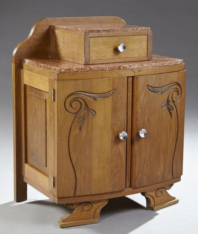 French Art Deco Carved Oak Marble Top Nightstand, early: French Art Deco Carved Oak Marble Top Nightstand, early 20th c., the serpentine back to a highly figured rouge marble topped center drawer on a bowed highly figured rouge marble over two incised carve