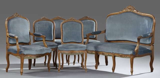 Louis XV Style Six Piece Carved Walnut Parlor Suite,: Louis XV Style Six Piece Carved Walnut Parlor Suite, early 20th c., consisting of a settee, a fauteuil and four side chairs, each with shell and leaf carved crest rails, on cabriole legs to French toe