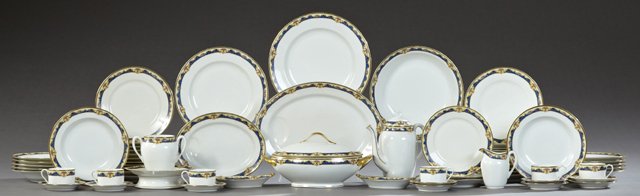 Sixty-Four Piece Set of Limoges Porcelain Dinnerware,: Sixty-Four Piece Set of Limoges Porcelain Dinnerware, by F. Quinque, with gilt rims and floral banding, consisting of 14 dinner plates, 12 soup bowls, 8 place plates, 6 cups, 9 saucers, sugar, creamer
