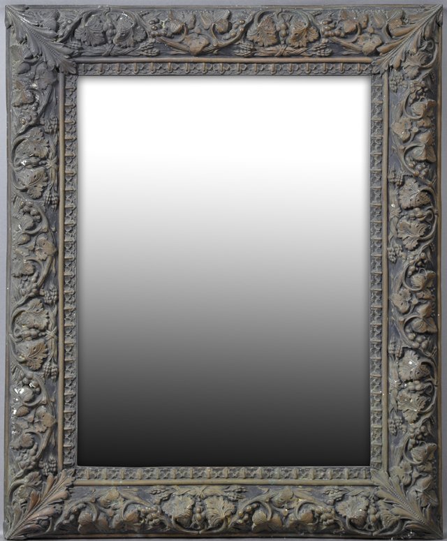 Unusual French Aesthetic Copper Overmantel Mirror, c.: Unusual French Aesthetic Copper Overmantel Mirror, c. 1880, with repousse decoration of grapes, leaves and tendrils around a wide beveled plate, H.- 45 in., W.- 36 1/2 in., D.- 2 3/4 in.