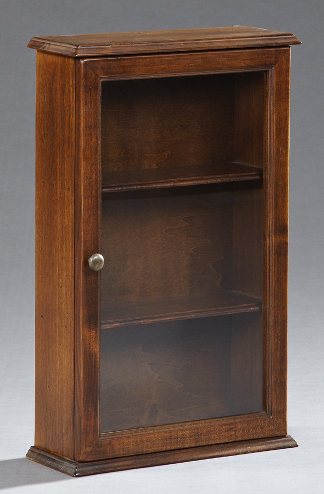 Carved Beech Hanging Curio Cabinet, 20th c., the: Carved Beech Hanging Curio Cabinet, 20th c., the stepped top over a glazed door, H.- 23 5/8 in., W.- 14 3/4 in.